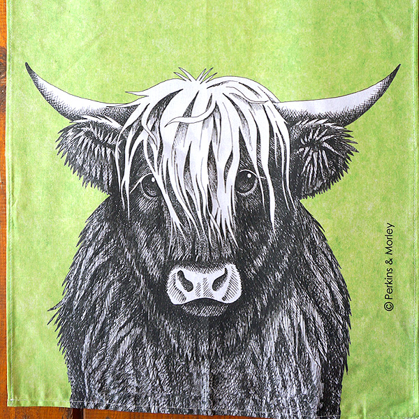 geschirrtuch schottische Kuh auf grünem Hintergrund